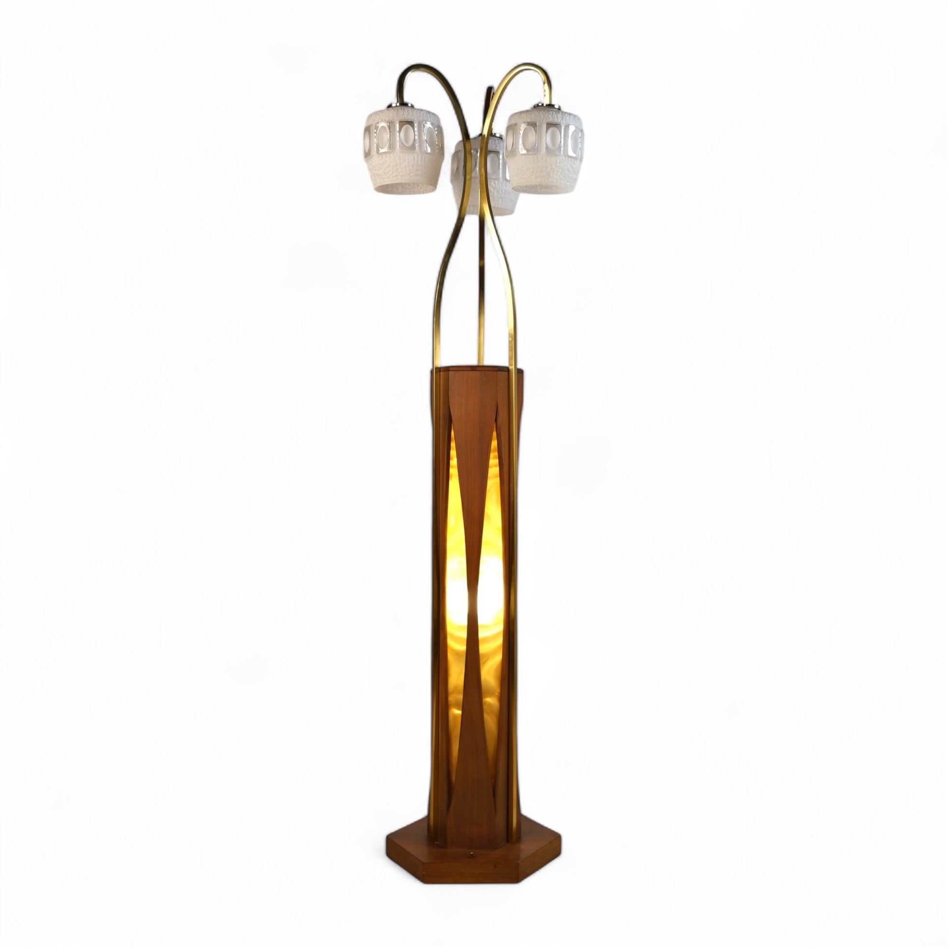 Sculptural mid-century modern floor lamp by Otto Guggenheim with walnut base and brass arms
