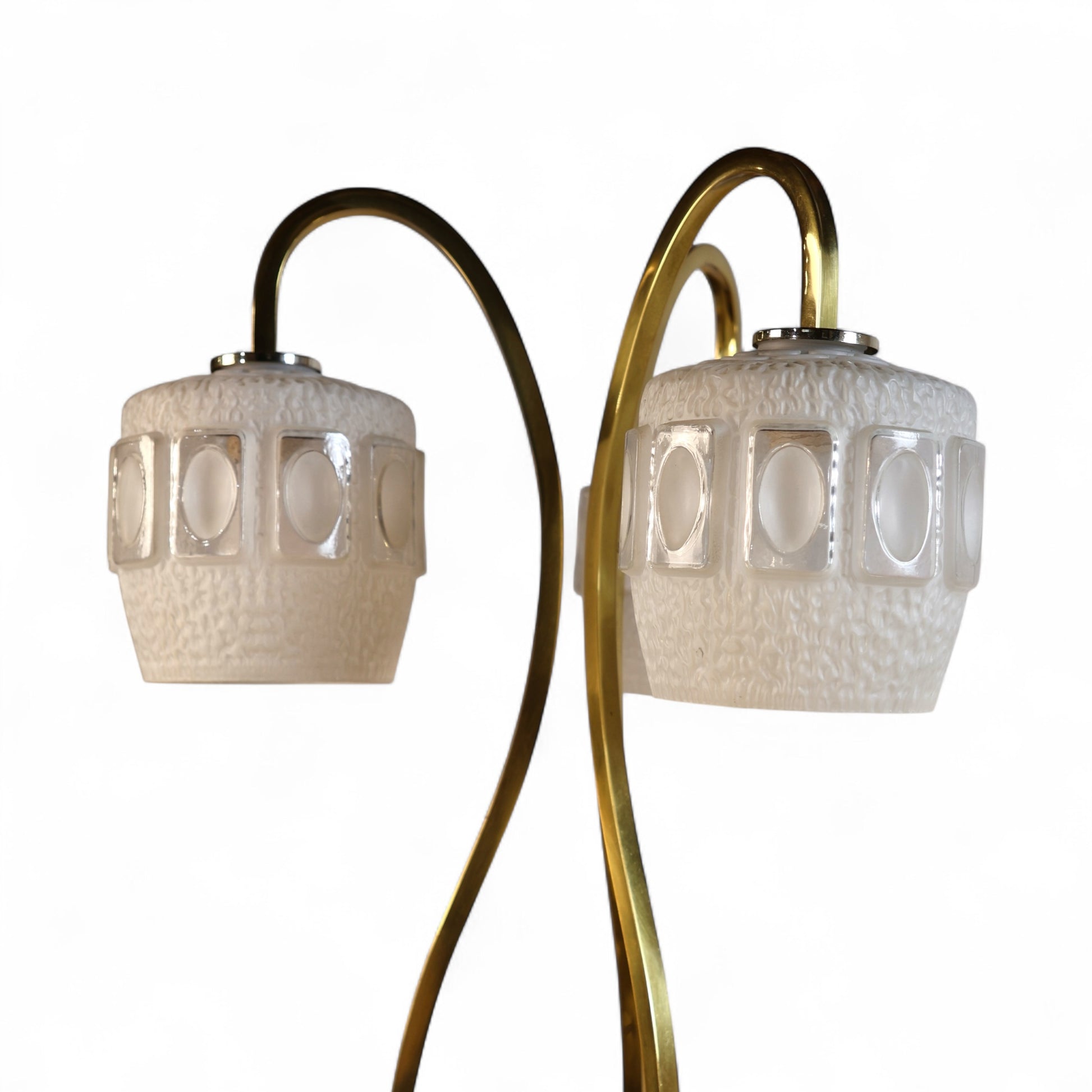 Hexagonal walnut base with inner diffuser lit from within, casting a warm ambient glow