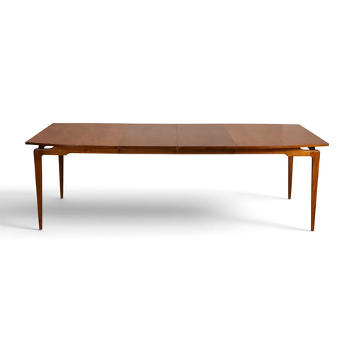 Young Manufacturing Contour dining table top view showing walnut grain and extension leaves