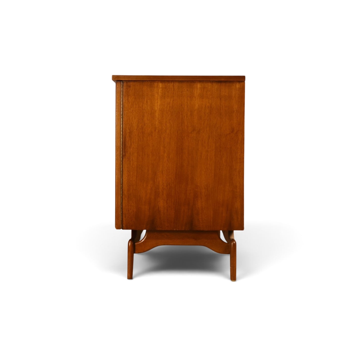 Young Manufacturing Contour walnut credenza side view showing sculpted base