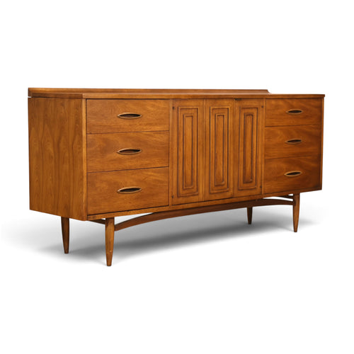 Broyhill Sculptra walnut lowboy dresser three-quarter view