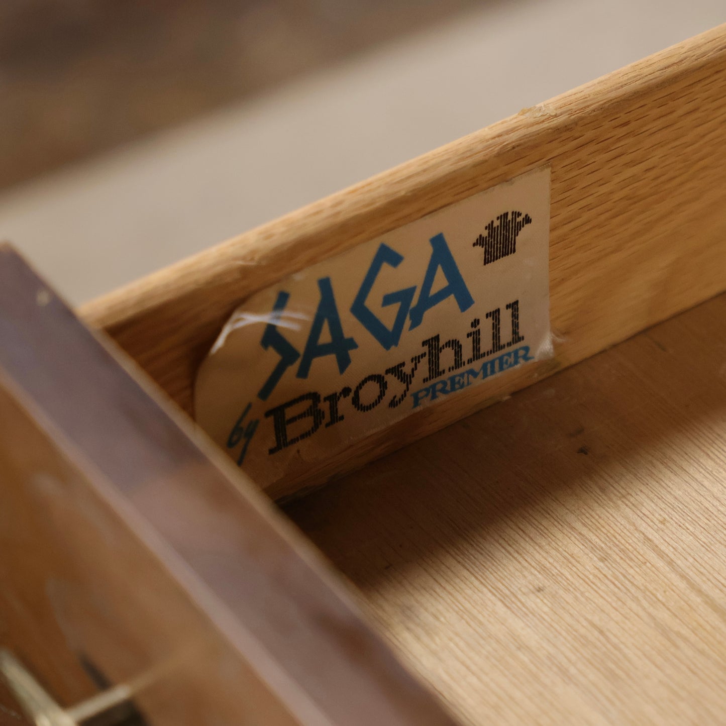 Saga by Broyhill label inside china cabinet drawer