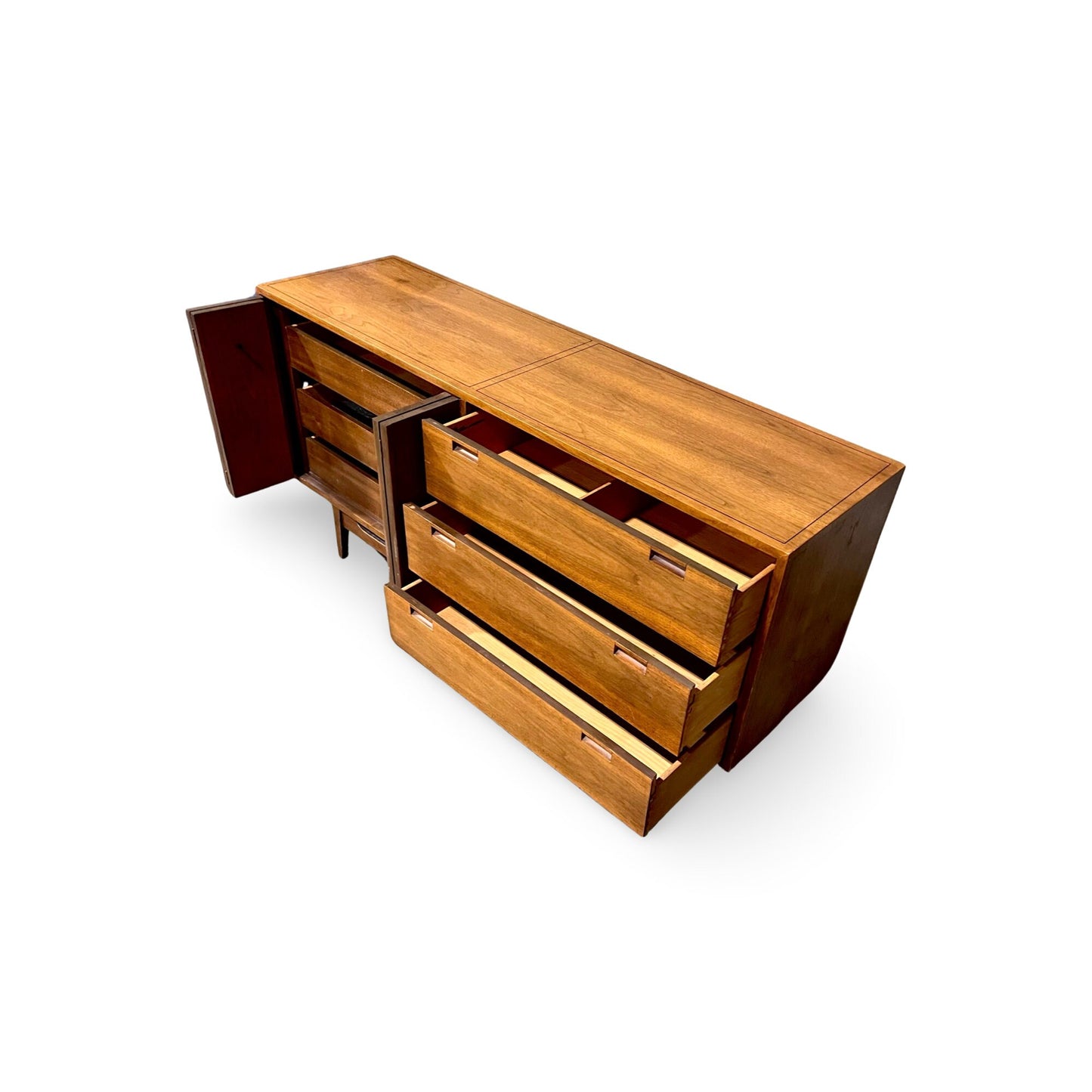 Timeless American MCM lowboy dresser, ideal for versatile storage solutions.