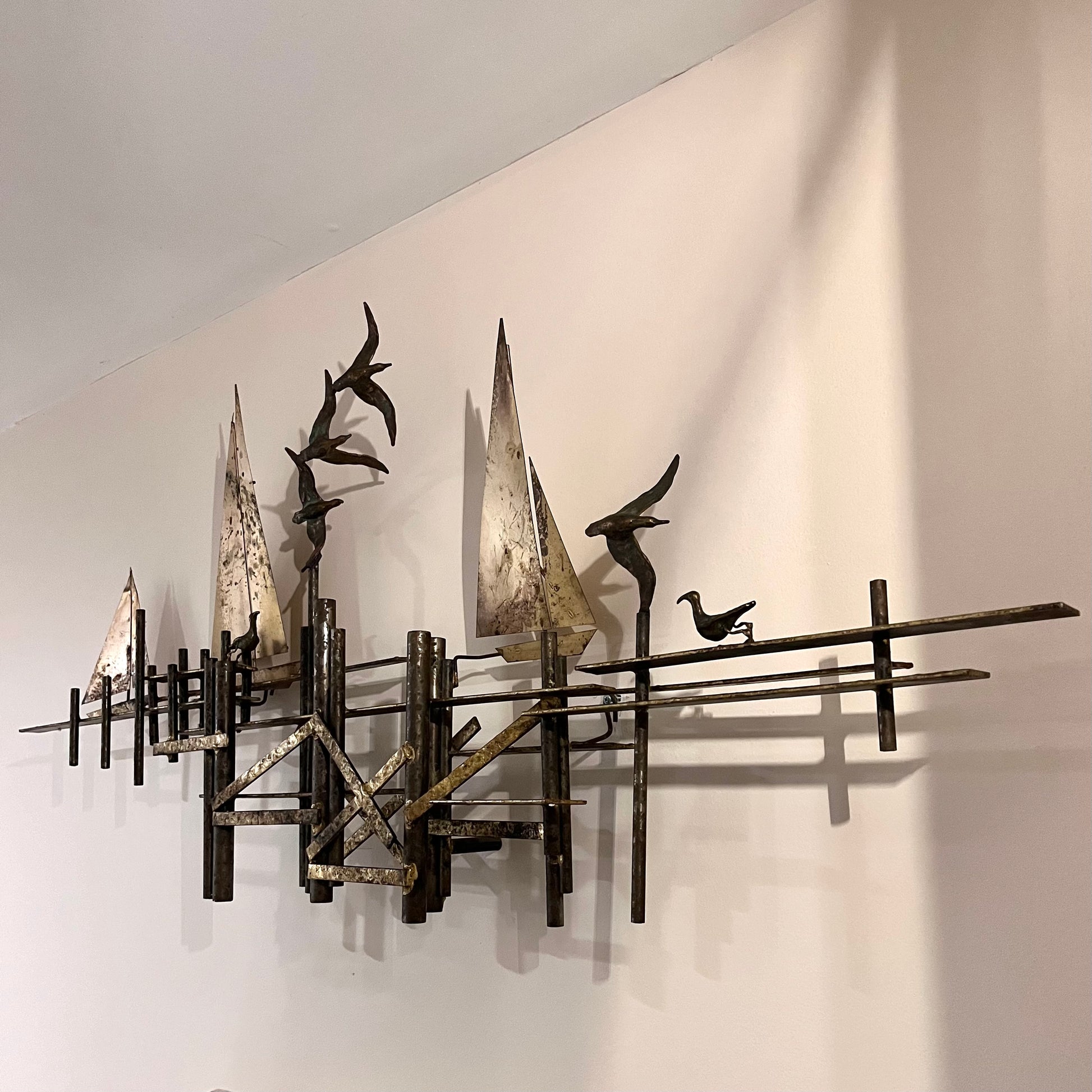 Brutalist wall sculpture by Curtis Jere, seagulls and sailboats