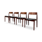 Scandinavian MCM dining chairs with black upholstered seats