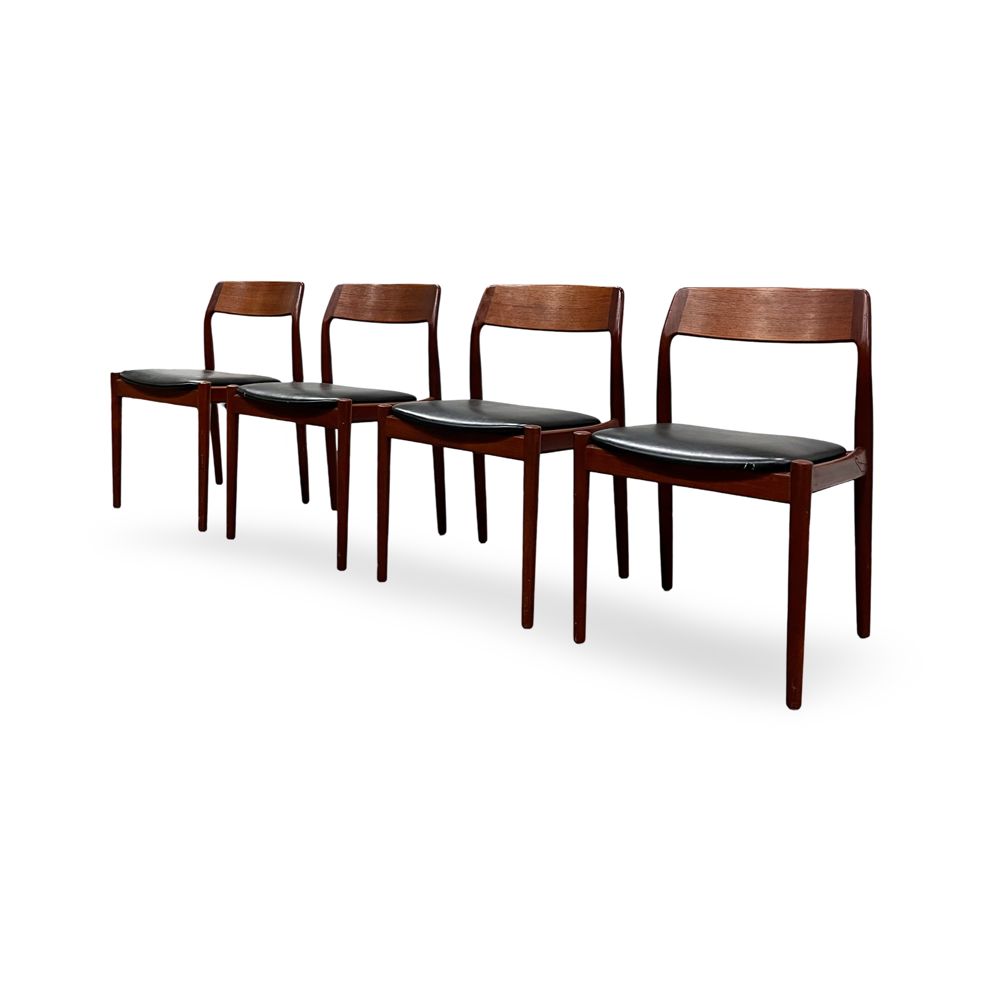 Scandinavian MCM dining chairs with black upholstered seats