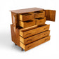Young Manufacturing sculptural highboy dresser angled view with all drawers open showing solid wood construction