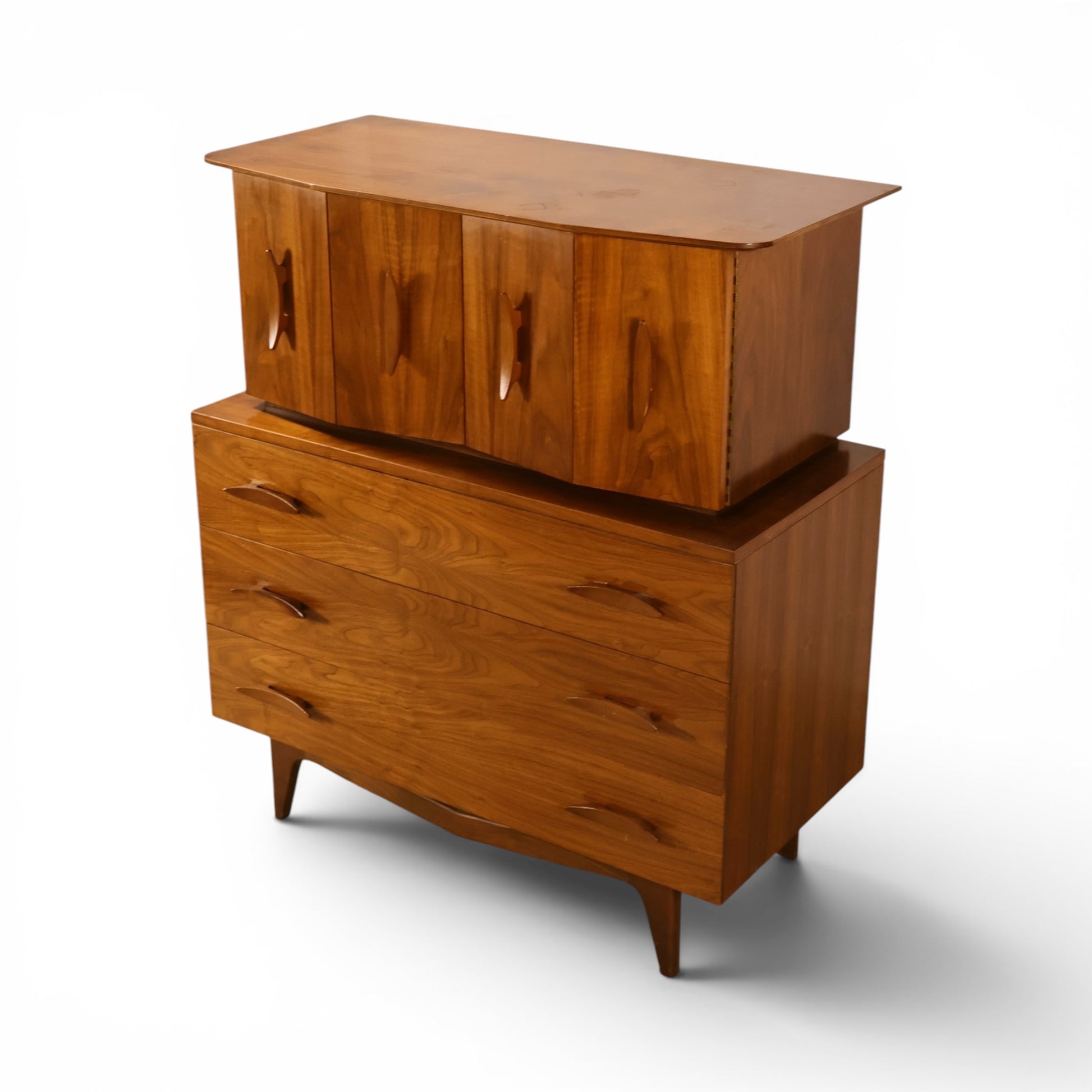 Young Manufacturing sculptural highboy dresser three quarter rear angle showing flared top overhang