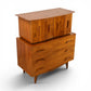 Young Manufacturing sculptural highboy dresser rear three quarter view showing case and crown