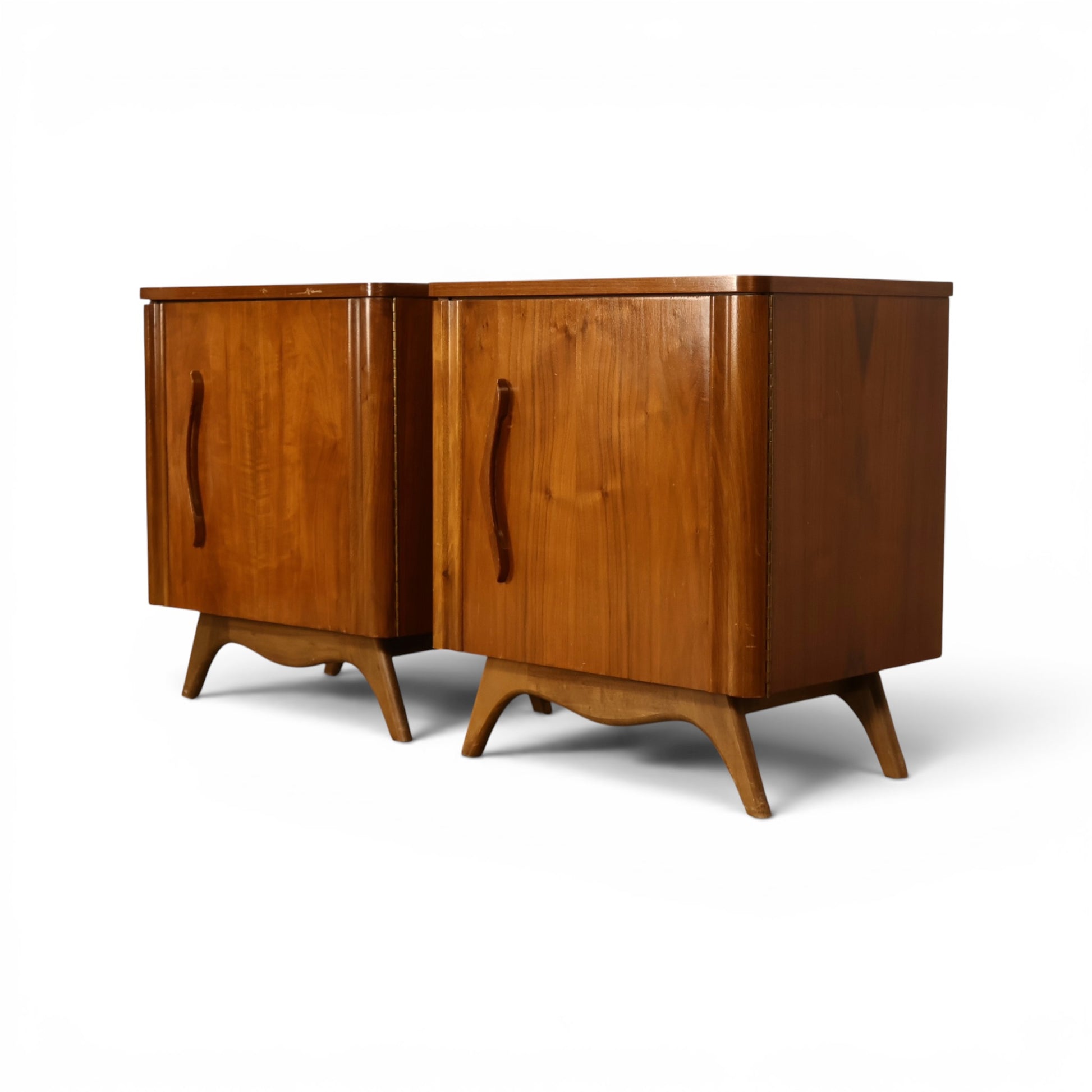 Young Manufacturing sculptural nightstands three quarter view in walnut