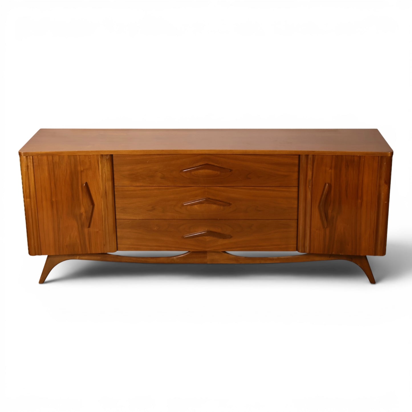 Young Manufacturing lowboy dresser straight on view showing bowed front and sculpted stretcher base