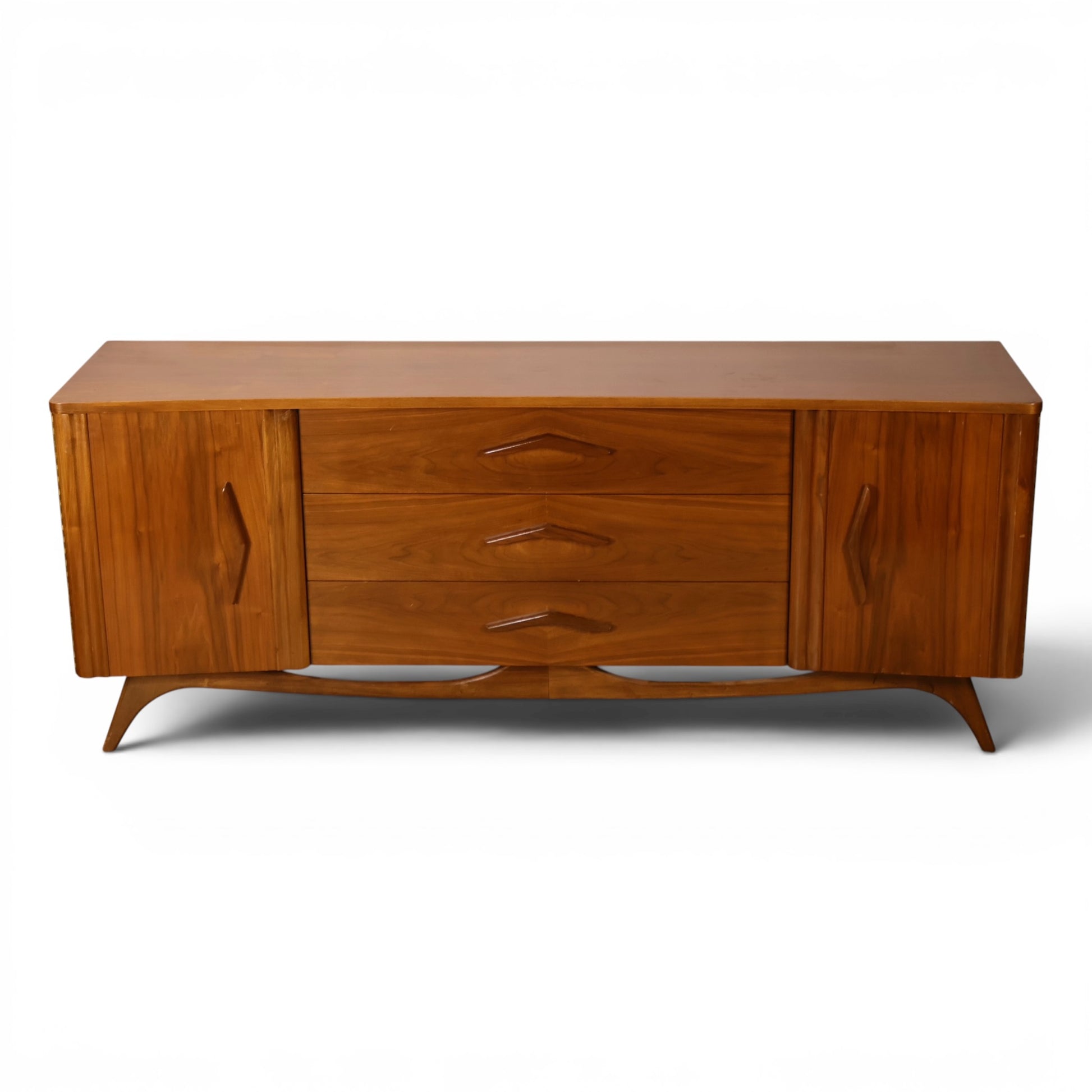 Young Manufacturing lowboy dresser straight on view showing bowed front and sculpted stretcher base