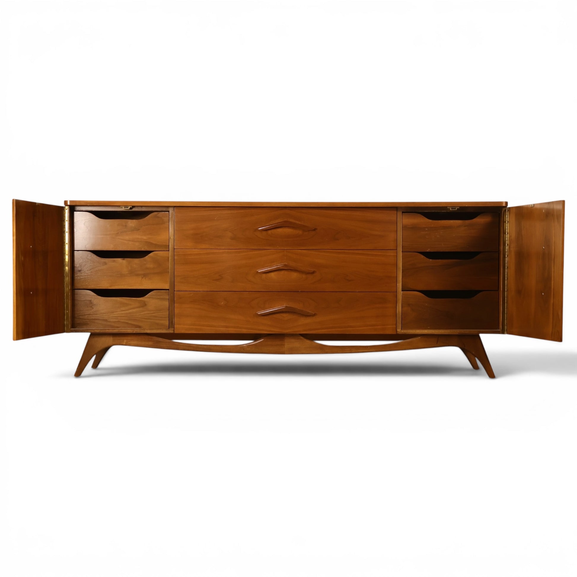 Young Manufacturing lowboy dresser with curved end doors open revealing concealed drawer banks