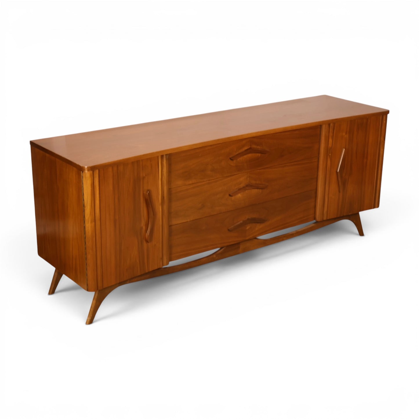 Young Manufacturing lowboy dresser angled view showing walnut grain and curved case front