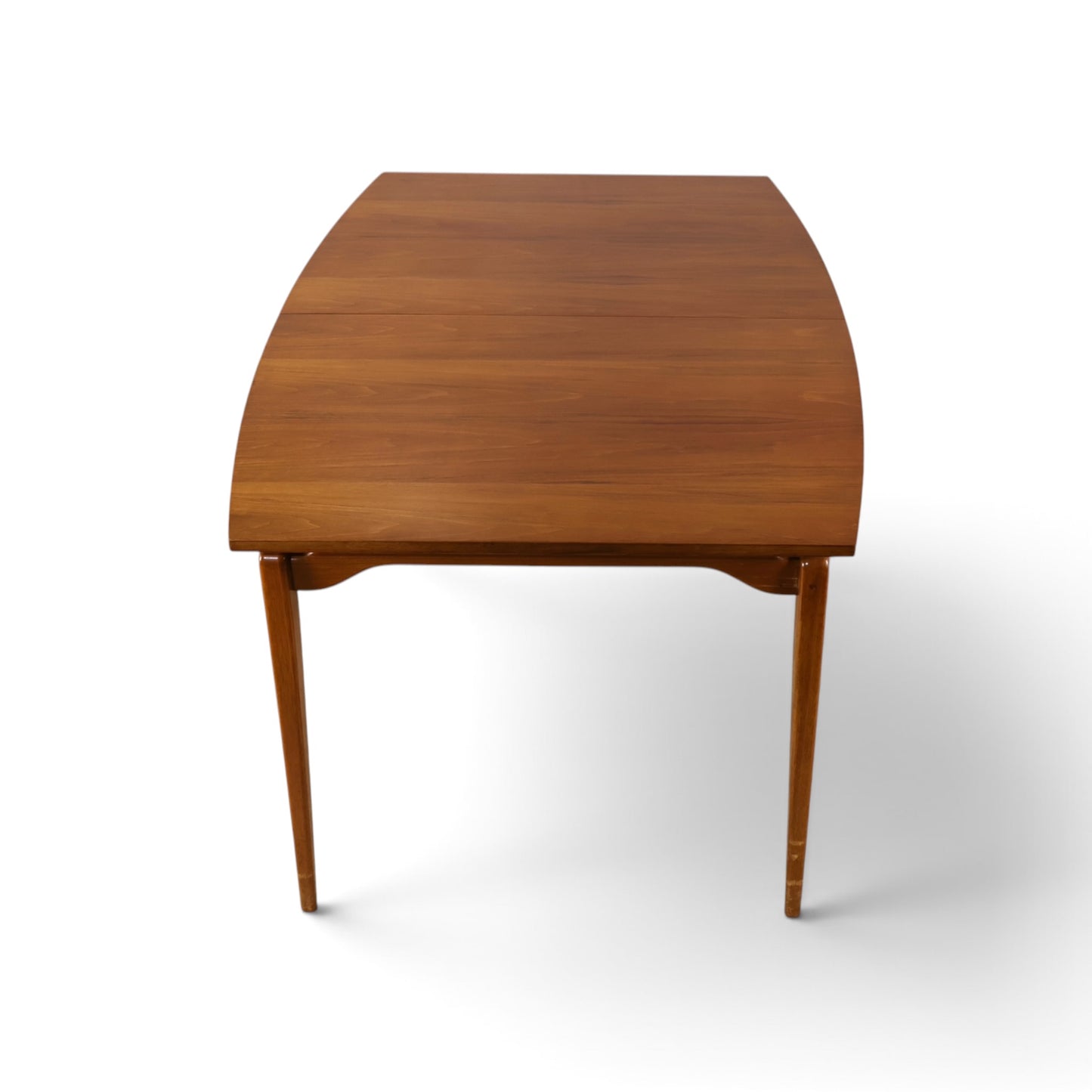 Young Manufacturing Contour dining table end view showing boat shaped walnut top