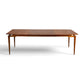 Young Manufacturing Contour dining table top view showing walnut grain and extension leaves