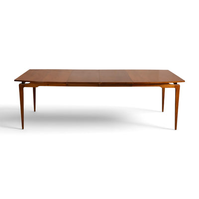 Young Manufacturing Contour dining table top view showing walnut grain and extension leaves