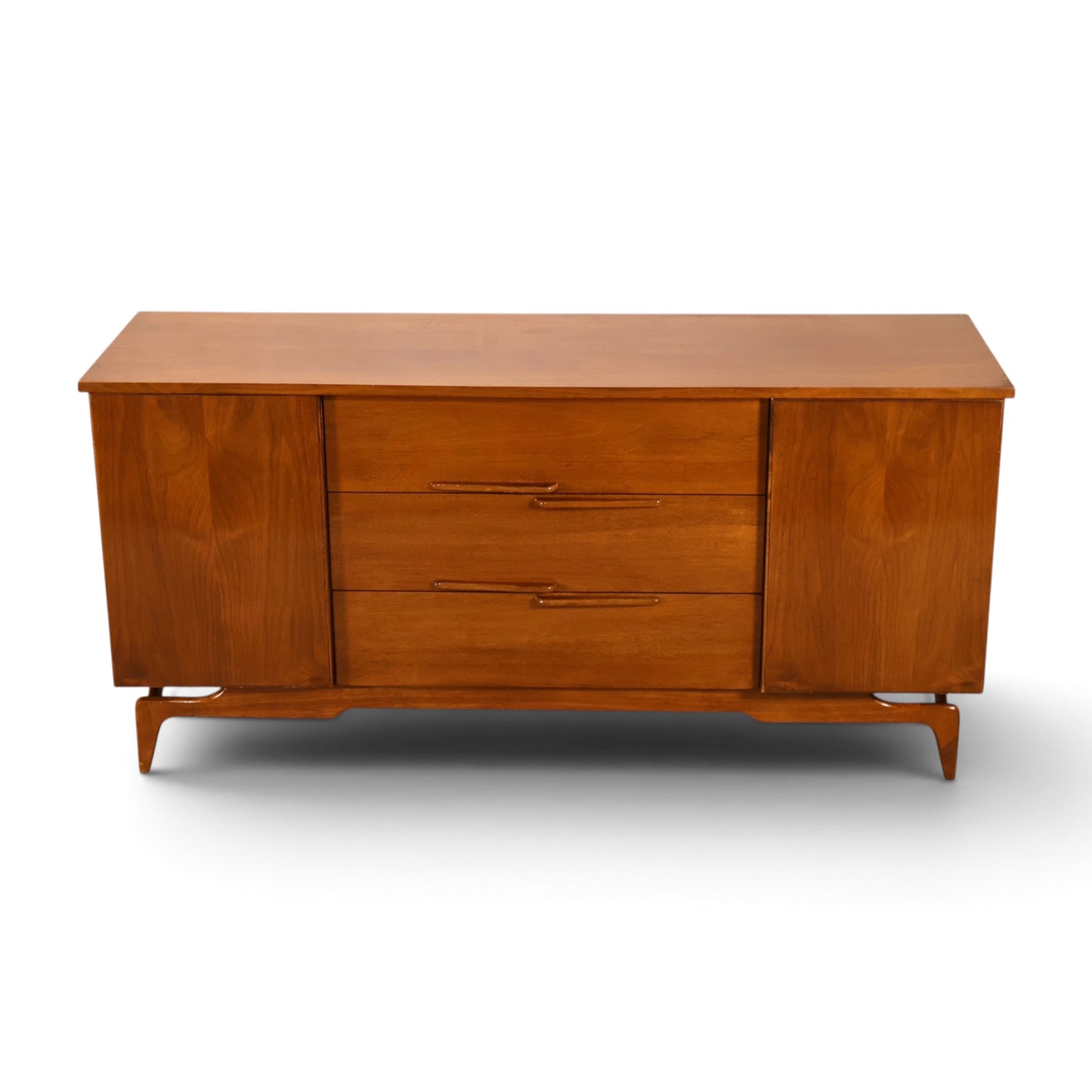 Young Manufacturing Contour walnut credenza front view showing grain and staggered pulls