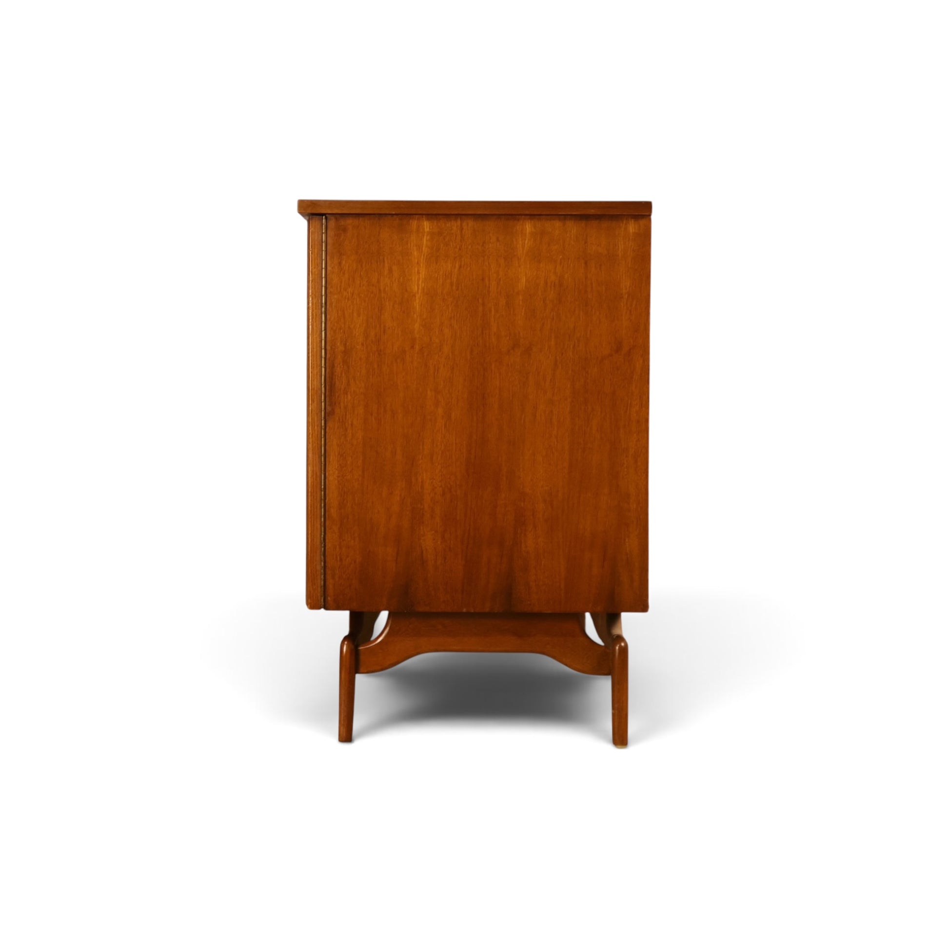 Young Manufacturing Contour walnut credenza side view showing sculpted base