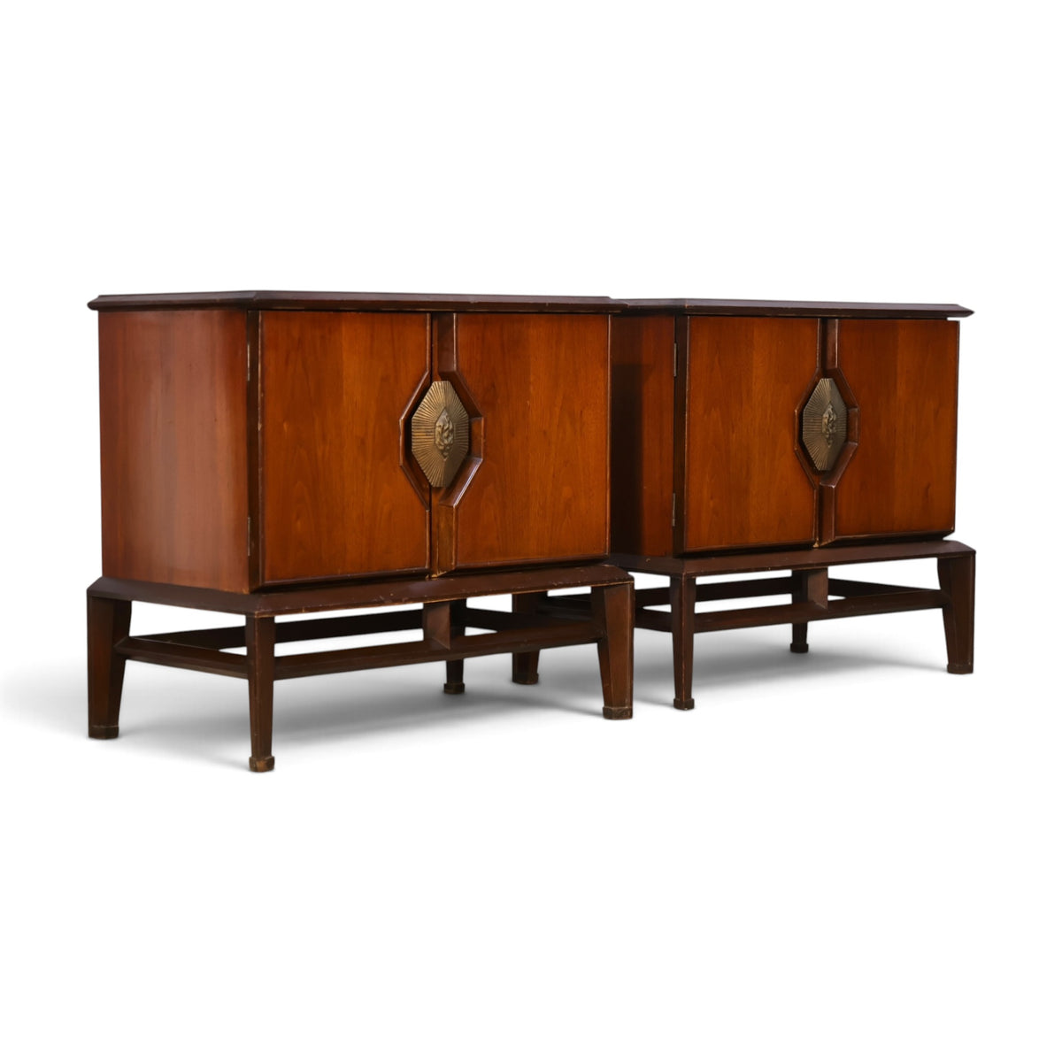 pair of Helen Hobey Baker walnut nightstands three-quarter view