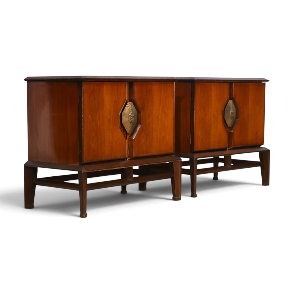 pair of Helen Hobey Baker walnut nightstands three-quarter view