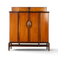Helen Hobey Baker burl and walnut highboy dresser front view with sunburst brass pull