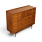 Broyhill Sculptra Magna walnut highboy dresser three-quarter view