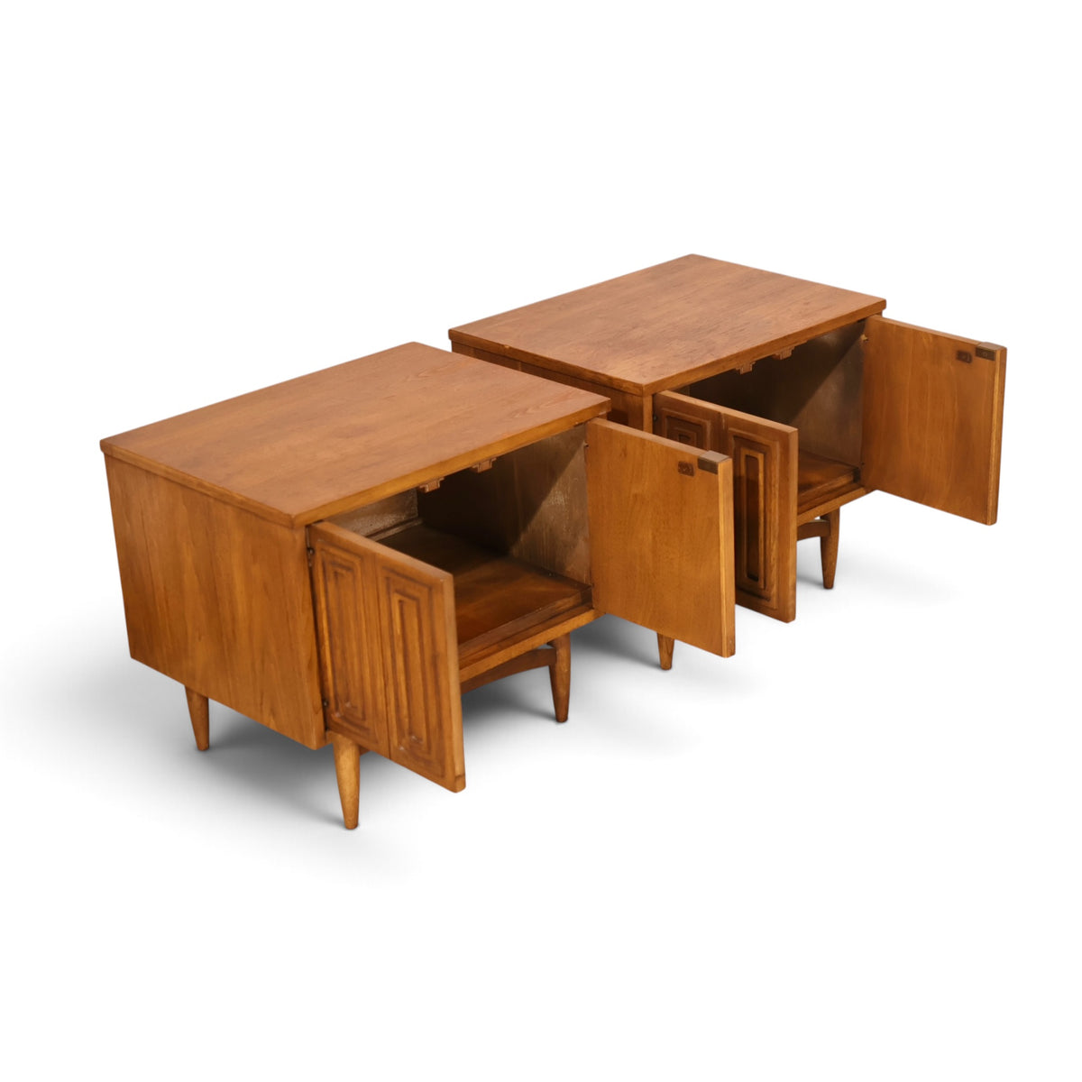 pair of Broyhill Sculptra walnut nightstands angled view with doors open