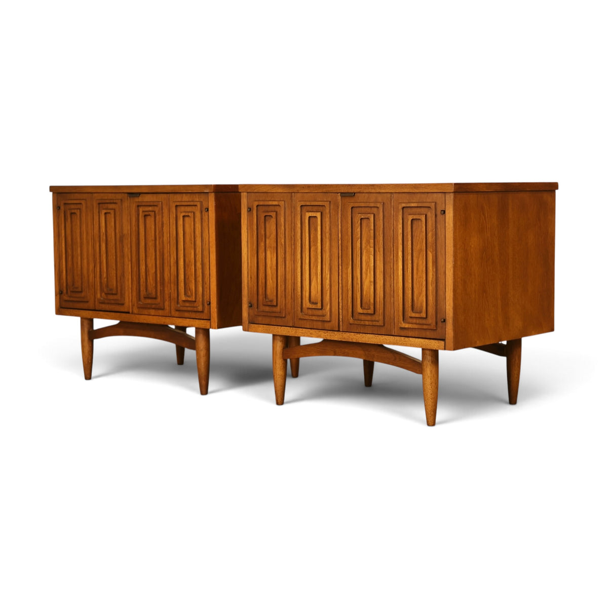 pair of Broyhill Sculptra walnut nightstands three-quarter view