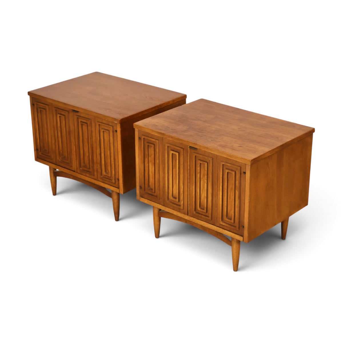 pair of Broyhill Sculptra walnut nightstands angled top view