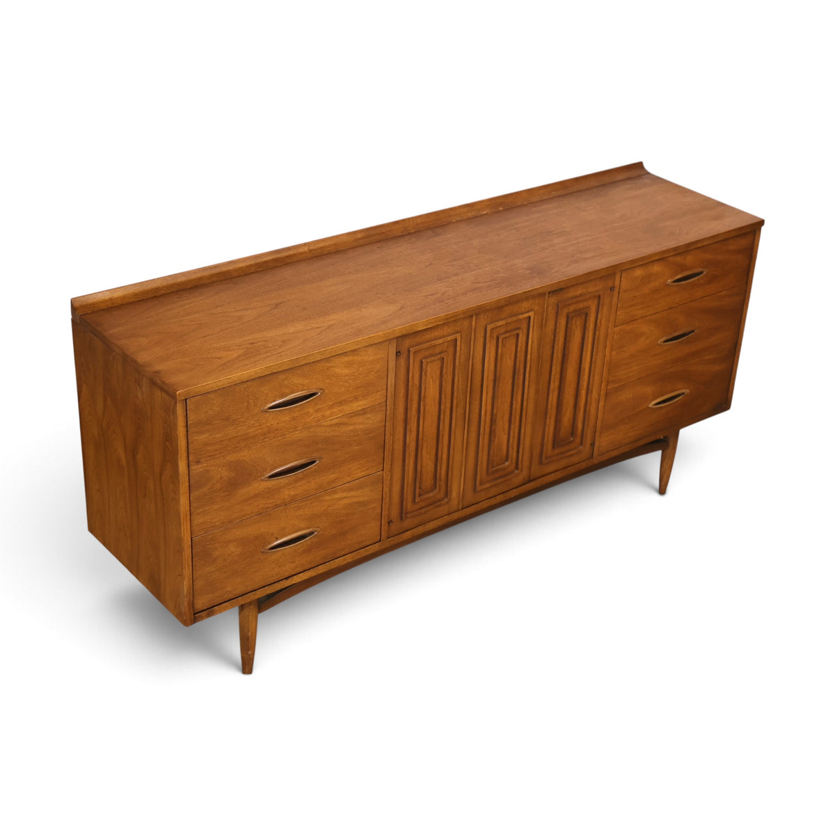 Broyhill Sculptra walnut lowboy dresser three-quarter top view