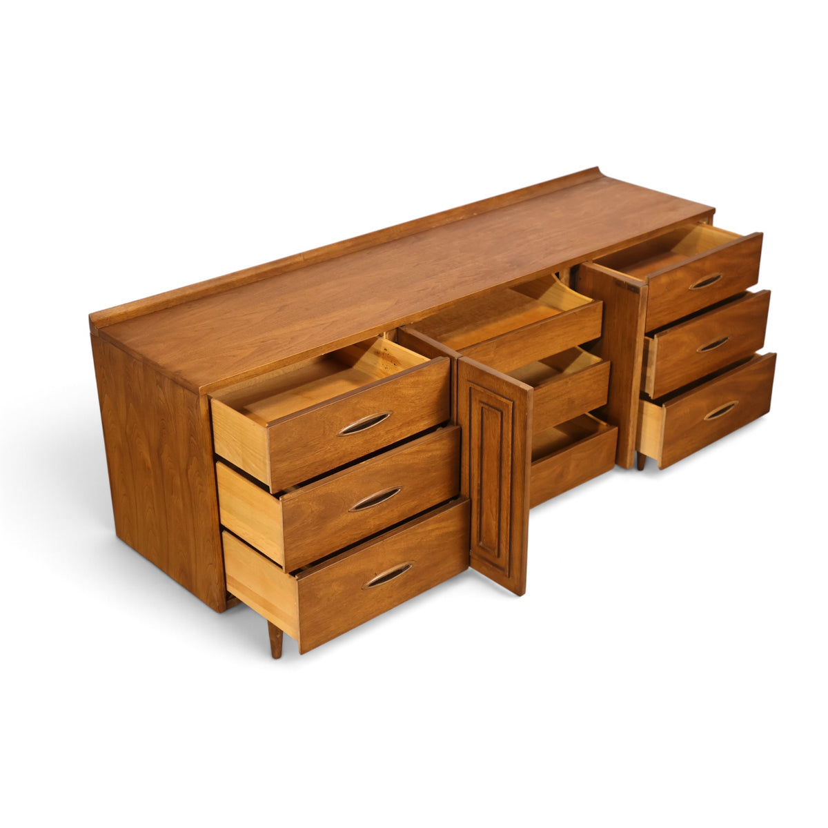 Broyhill Sculptra walnut lowboy dresser angled view with drawers open