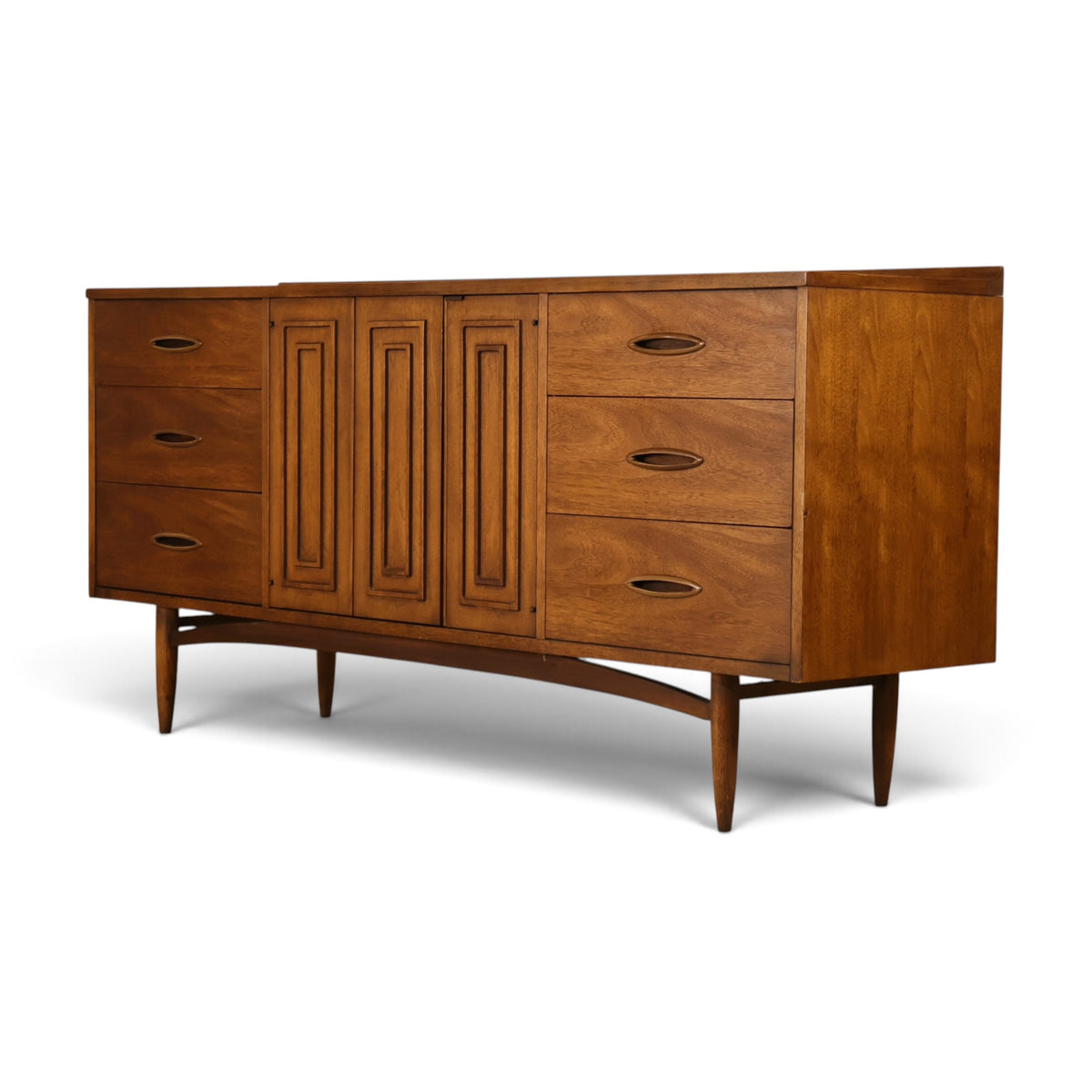 Broyhill Sculptra walnut lowboy dresser three-quarter view