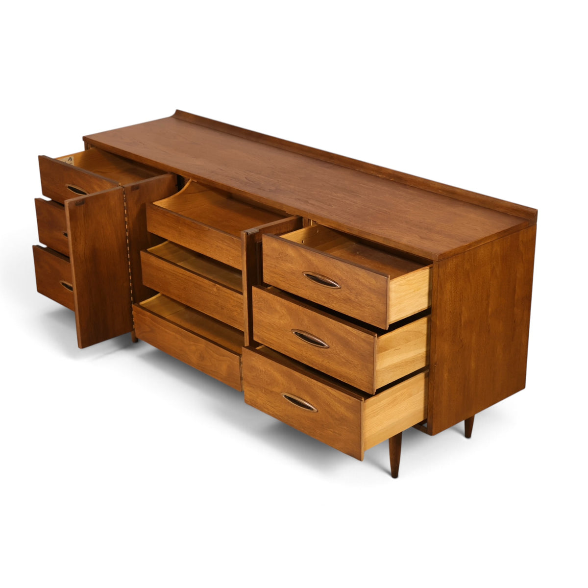 Broyhill Sculptra walnut lowboy dresser angled view with drawers open