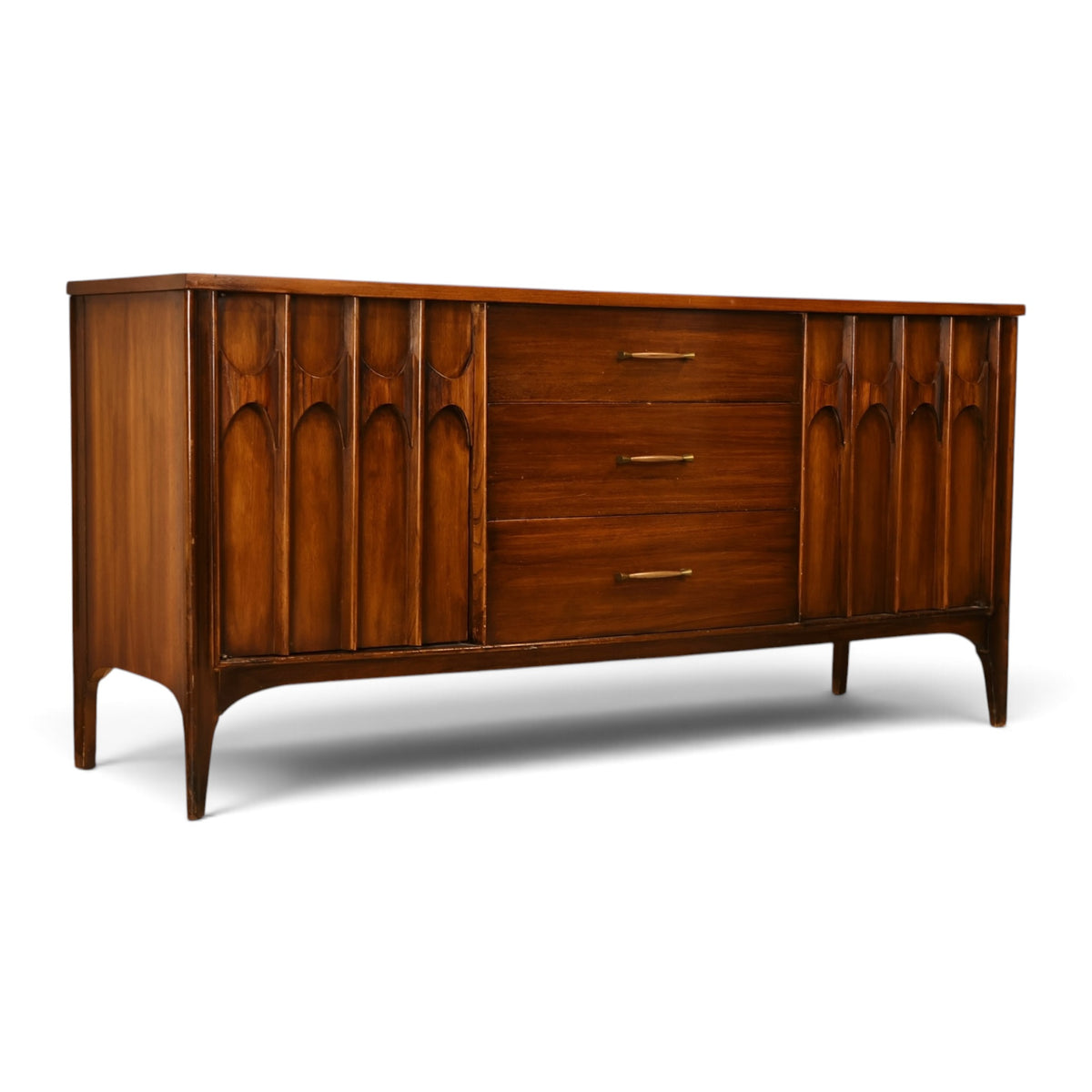 Kent Coffey Perspecta walnut credenza angled front view with sculpted legs