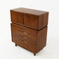 Cavalier Furniture MCM walnut two-piece highboy dresser, 3/4 left-front angle with upper right cabinet door open and all lower drawers extended showing walnut interiors, c. 1960s