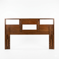 Cavalier Furniture MCM walnut bookcase headboard, rear view showing back panel construction with metal bracket hardware, solid walnut frame, c. 1960s