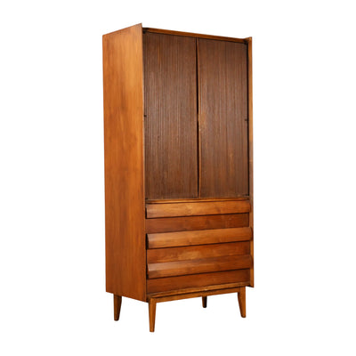 Lane First Edition armoire three-quarter view with reeded doors closed
