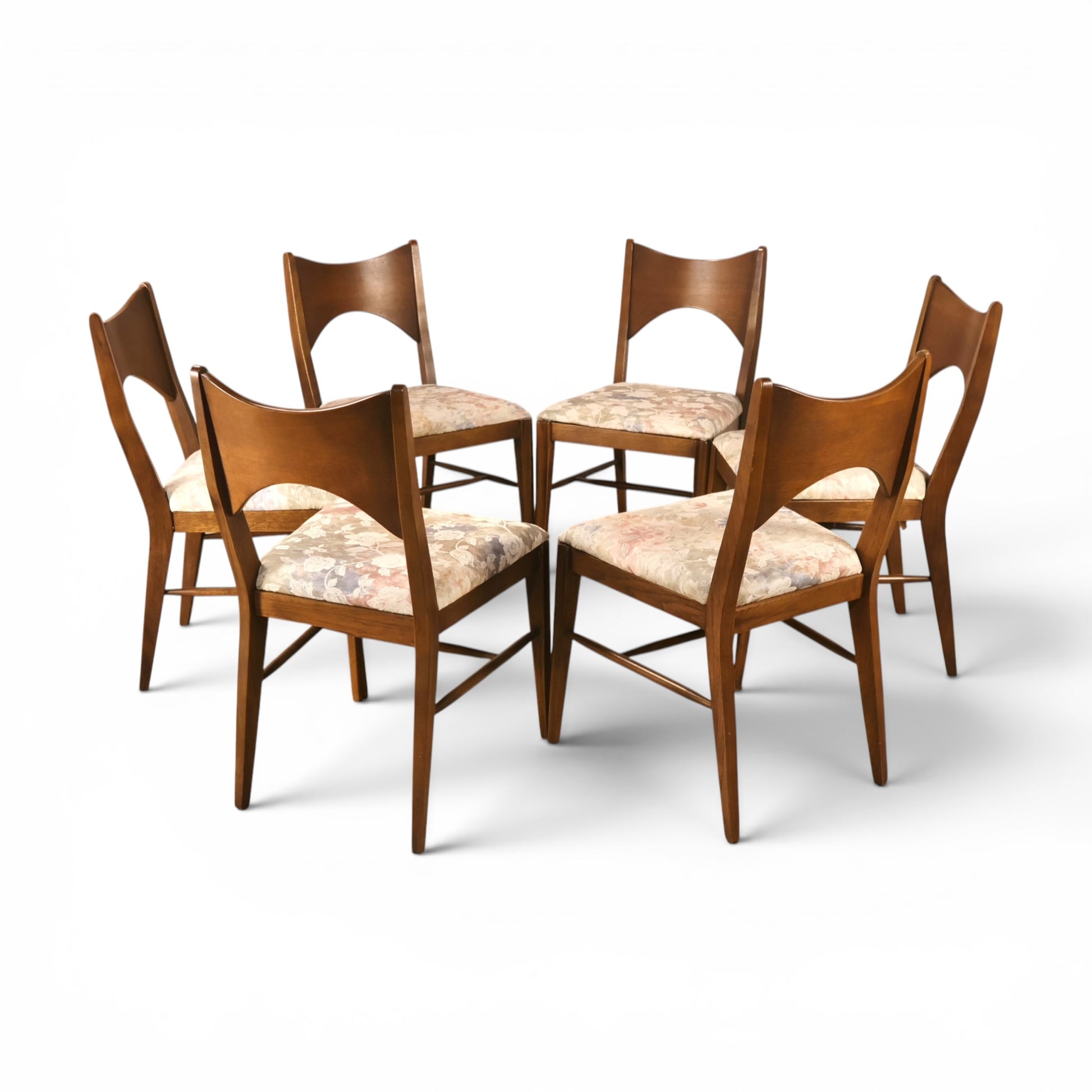 Broyhill Saga dining chairs side angle showing tapered legs and stretchers