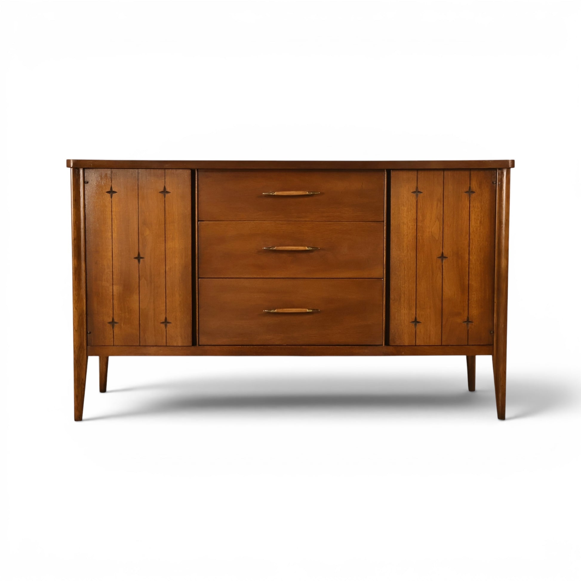 Broyhill Saga walnut buffet credenza front view with star inlay doors and three center drawers