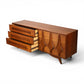 Specialty Woodcraft lowboy open storage detail behind sliding door