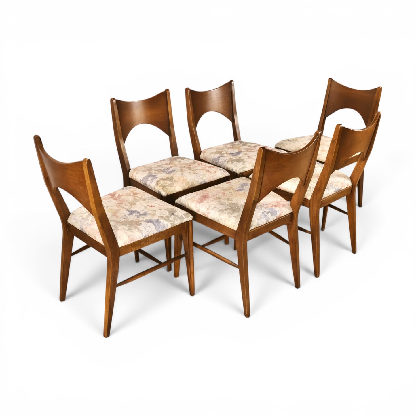 Broyhill Saga dining chairs angled view showing sculpted backs
