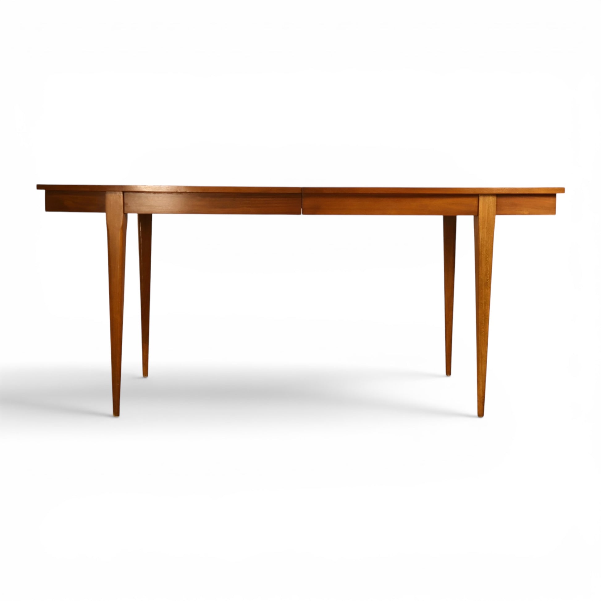 Young Manufacturing walnut dining table front view on tapered legs