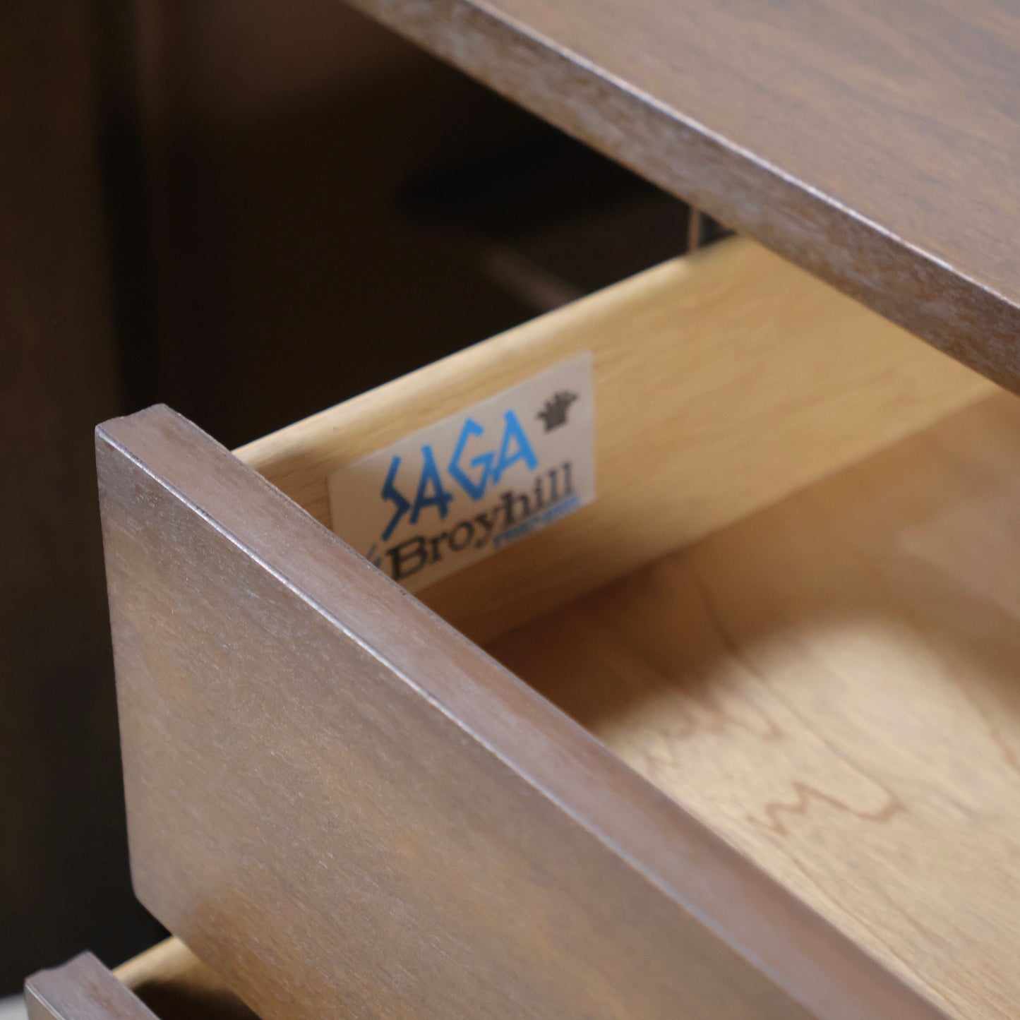 Saga by Broyhill Premier label inside credenza drawer