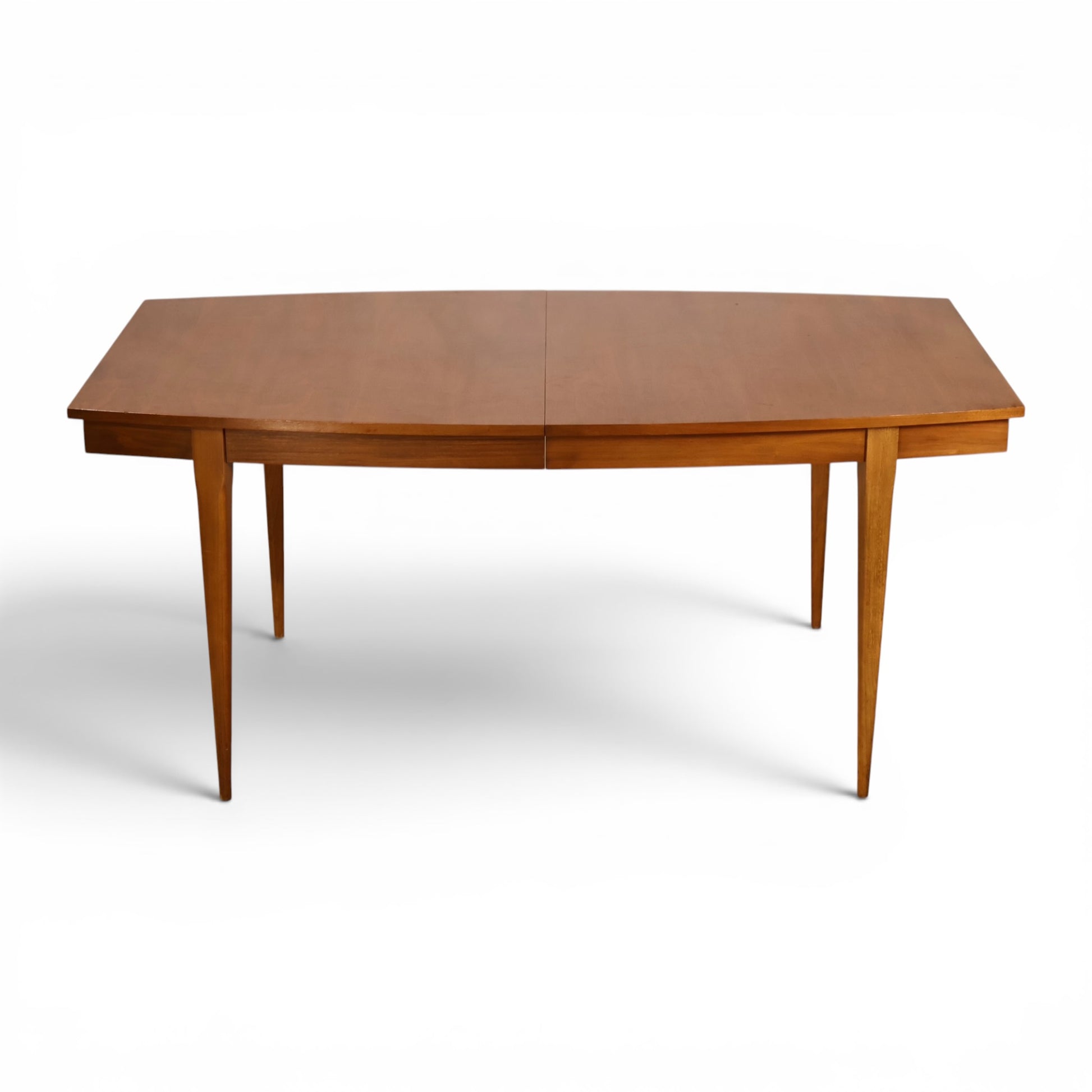 Young Manufacturing dining table showing boat shaped walnut top