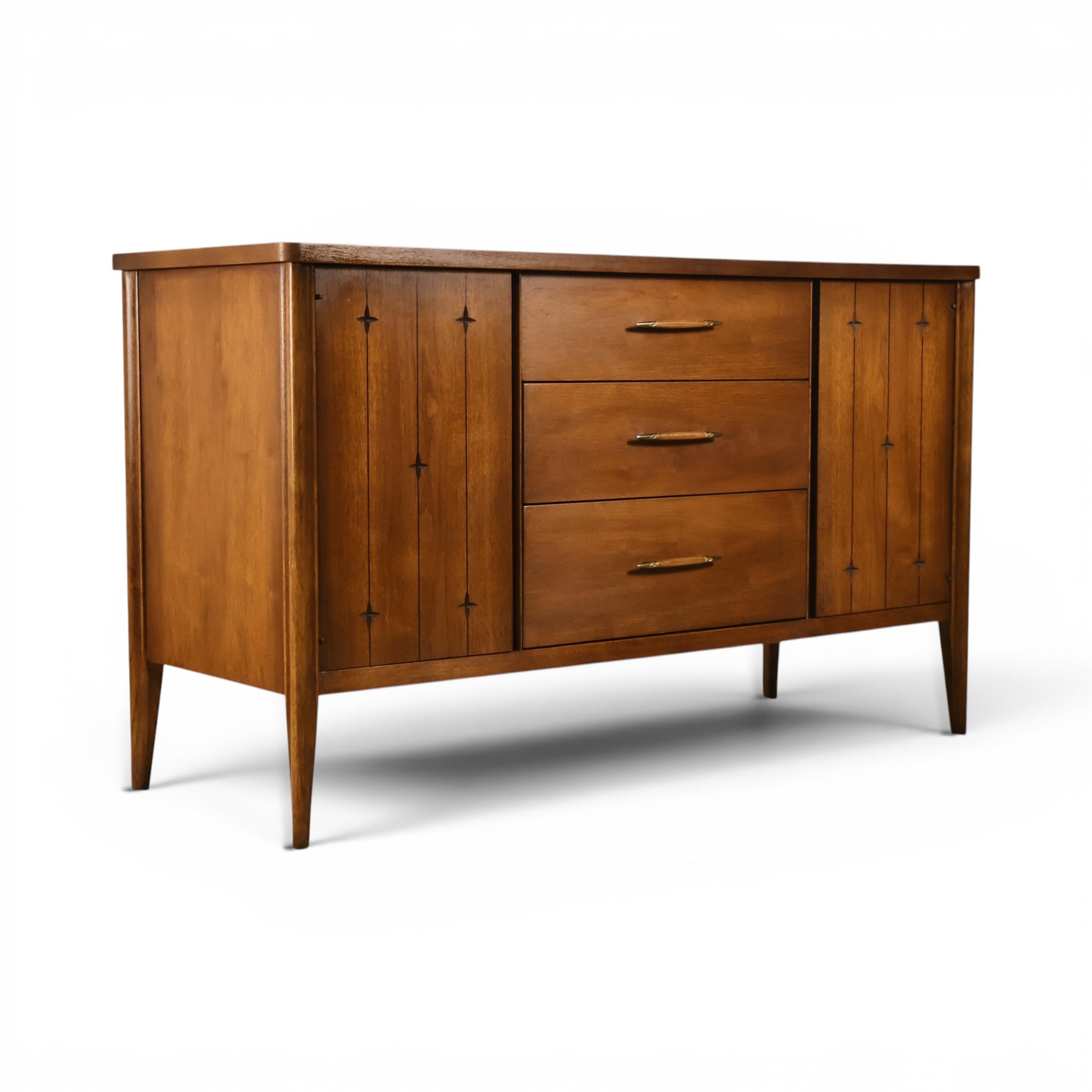 Broyhill Saga credenza three quarter view showing star inlay door detail