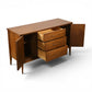 Broyhill Saga credenza open doors showing three interior drawers