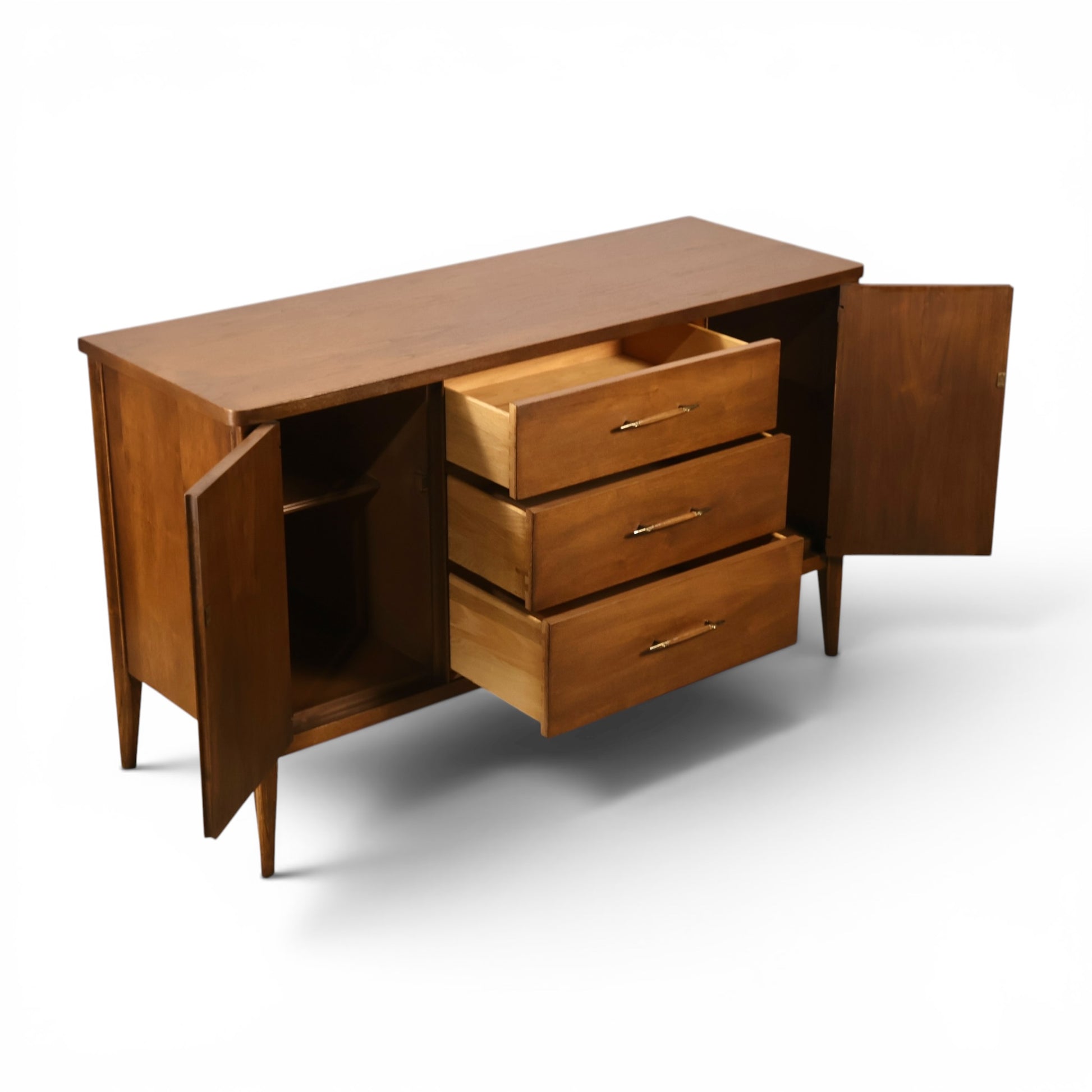 Broyhill Saga credenza open doors showing three interior drawers
