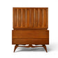 Tobago walnut highboy dresser full front view with carved doors and sculptural base