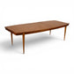 Young Manufacturing extended dining table showing walnut grain